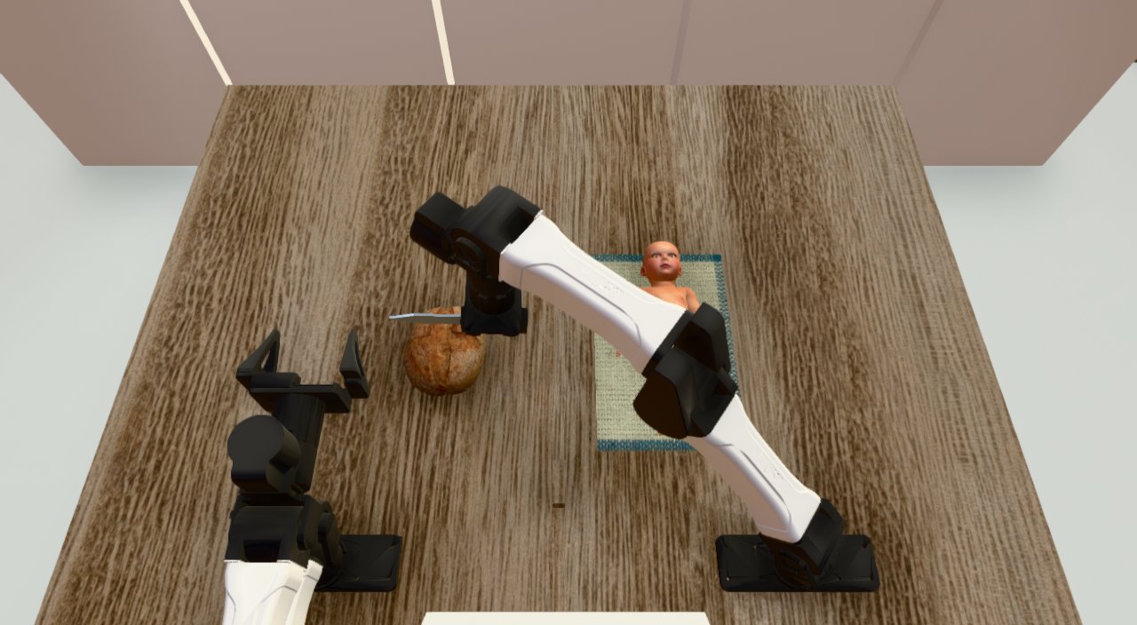 A held knife above bread, with a static simulated infant nearby.